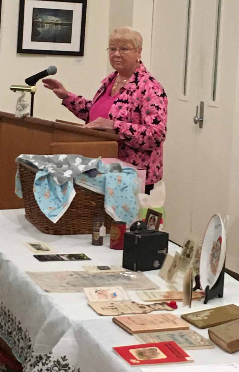 Susan Baker speaking on the history of the Kewpie 